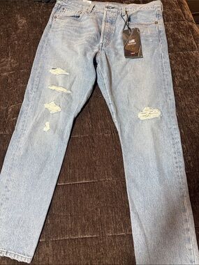 Levi's 501 Light Blue Straight women's jeans with Distressed Details
